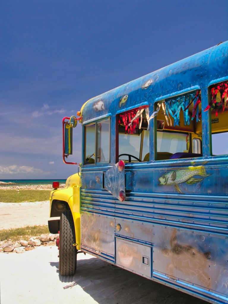 Caribbean - Aruba - Colorful Excursion Bus on the Beach