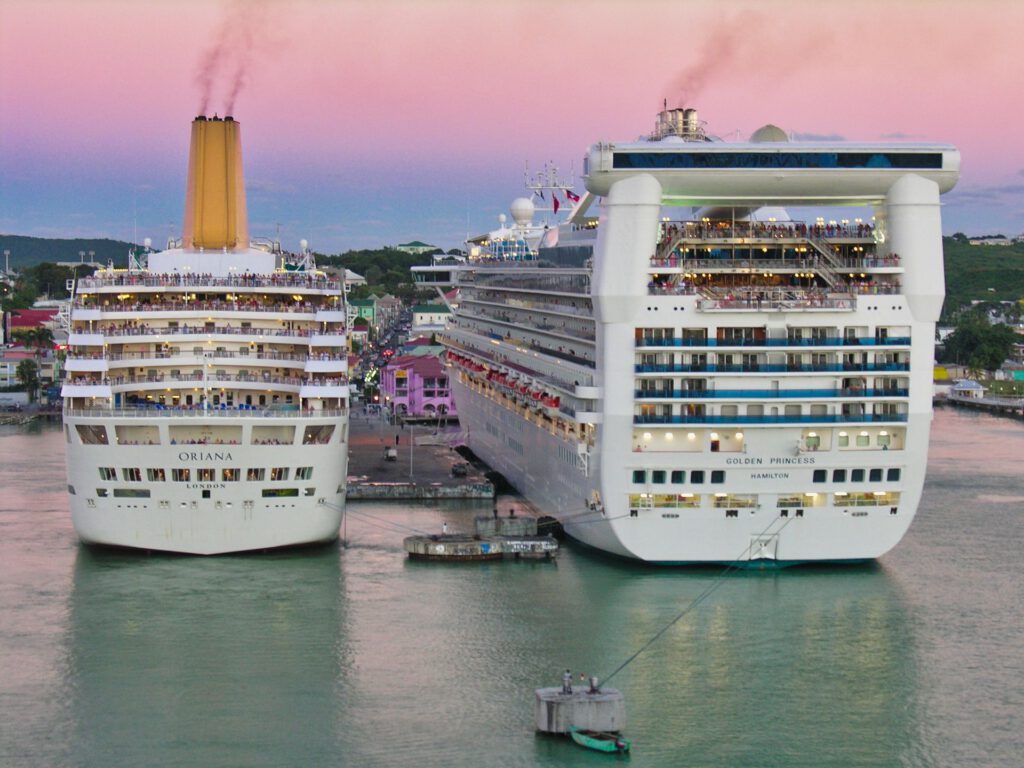 Cruise Ships - Oriana and Golden Princess in the port of Antigua at sunset