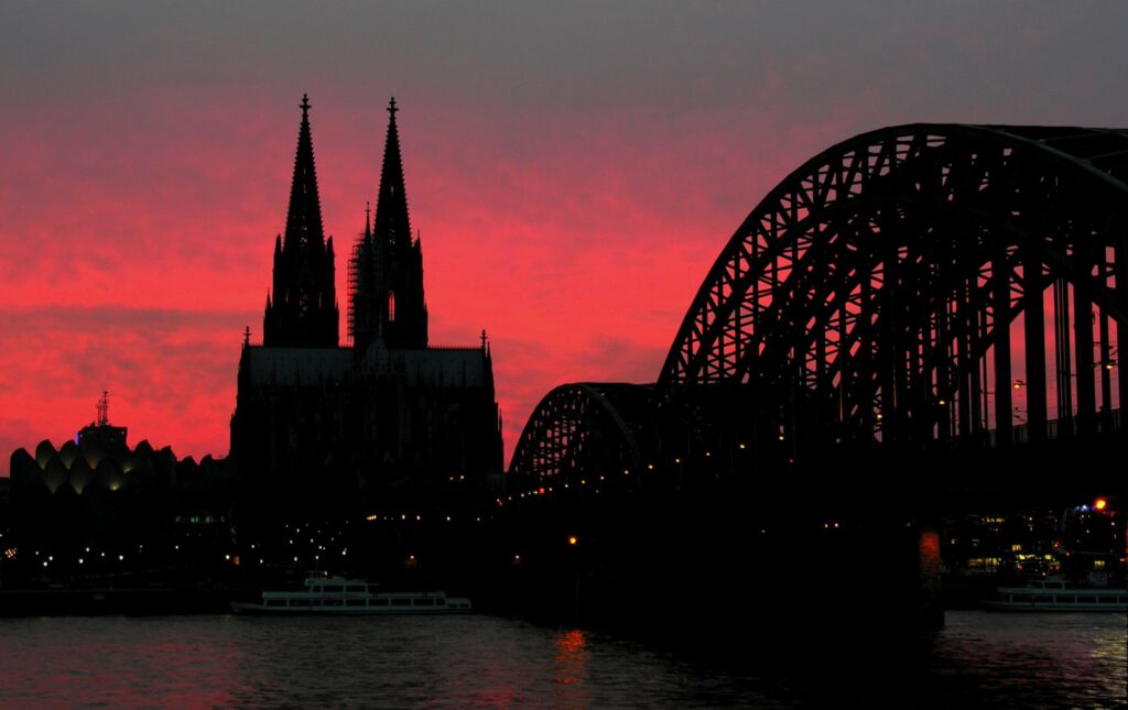 Germany - Cologne - Cologne Cathedral and bridge at sunset
